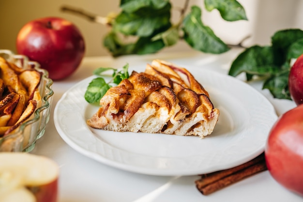 Delicious apple cake on kitchen table. Apples season. Autumn