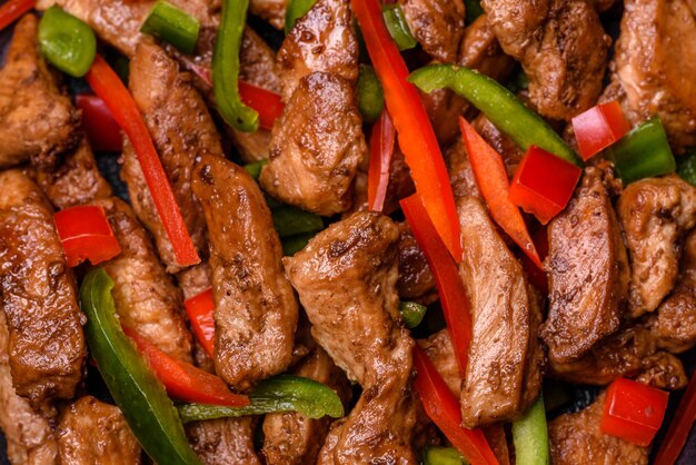 Delicious Asian teriyaki meat with red and green bell peppers