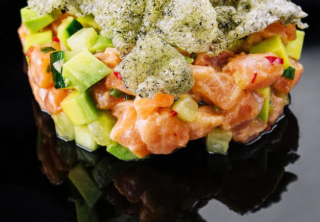 Delicious avocado and raw salmon salad tartare