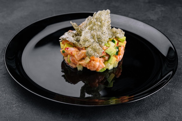 Delicious avocado and raw salmon salad tartare