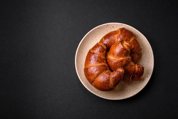 Delicious baked crispy croissants as an element of an invigorating nutritious breakfast