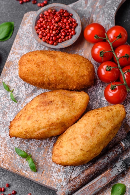 Delicious baked potato cutlet stuffed with chicken and vegetables spices and salt