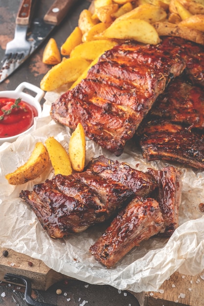 Delicious barbecued ribs with potato.