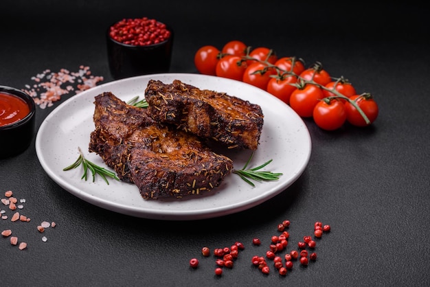 Delicious beef or pork steak on the bone grilled with spices and rosemary