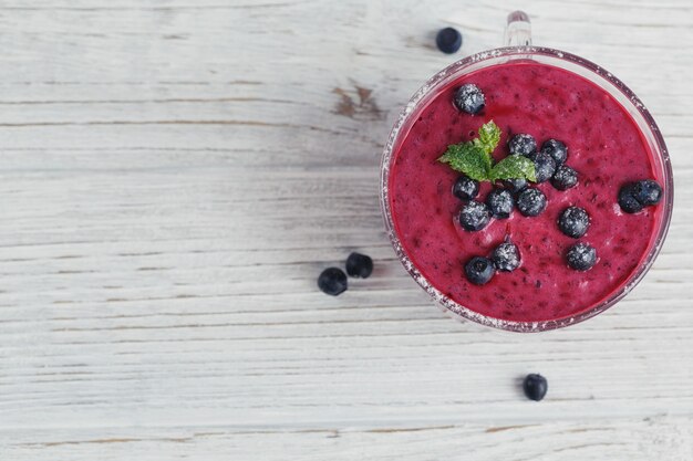 Delicious bilberry smoothie with fresh berries