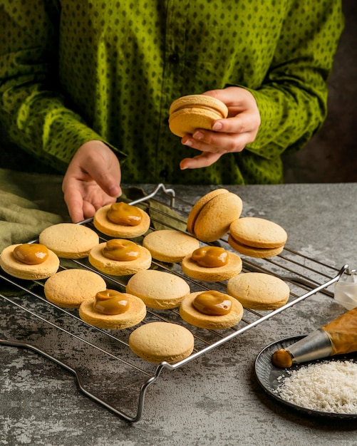 Delicious biscuits with cream high angle