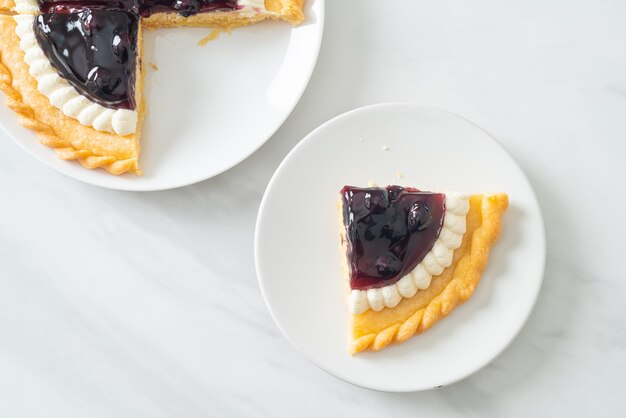 Delicious Blueberry Cheese Pie on white plate