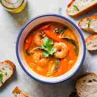 Photo a delicious bouillabaisse soup food in a bowl marseille food and healthy protein soup meal concept