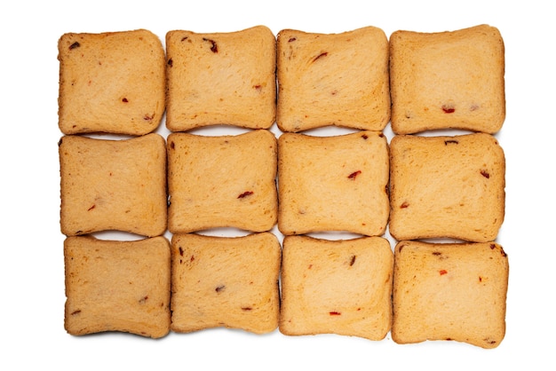 Photo delicious bread slices isolated on a white wall, top view.