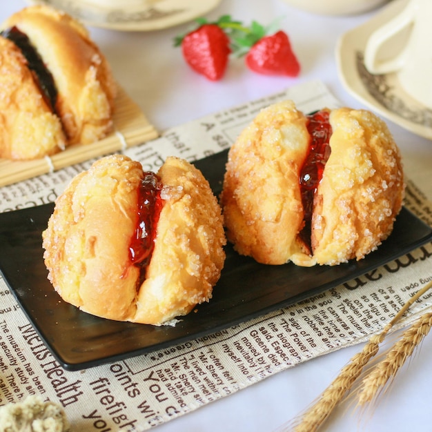 Delicious bread with strawberry jam