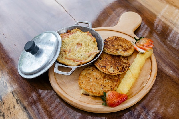 Delicious breakfast with egg and corn cake