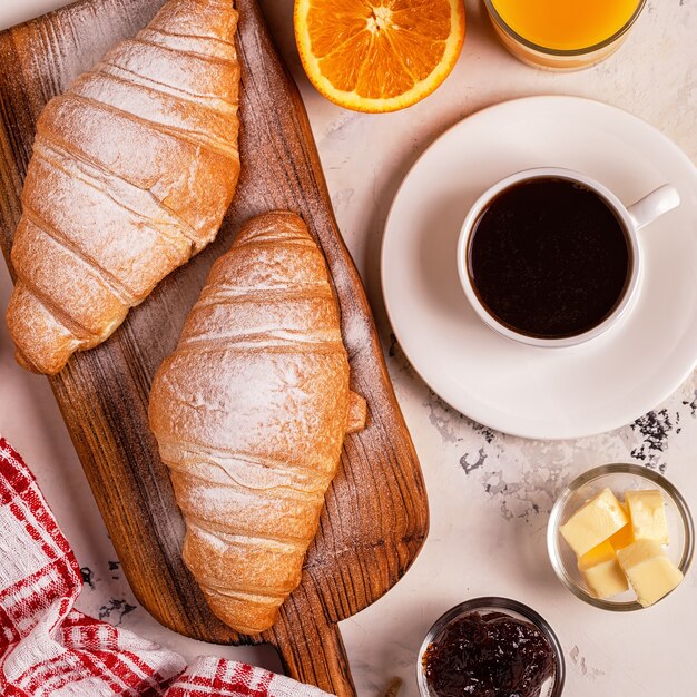 Delicious breakfast with fresh croissants