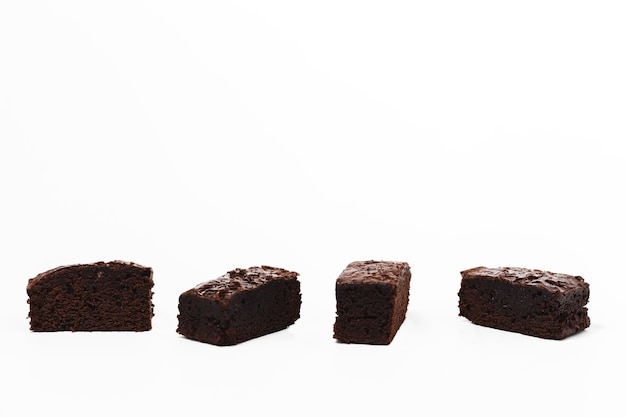 Delicious brownies cake on white background for bakery food and eating concept