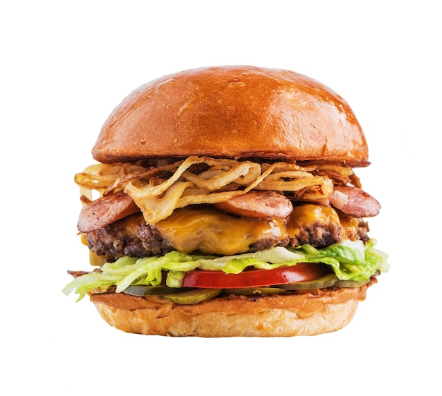 delicious burger with beef fried onions cucumbers and tomatoes and frankfurter rindswurst isolated