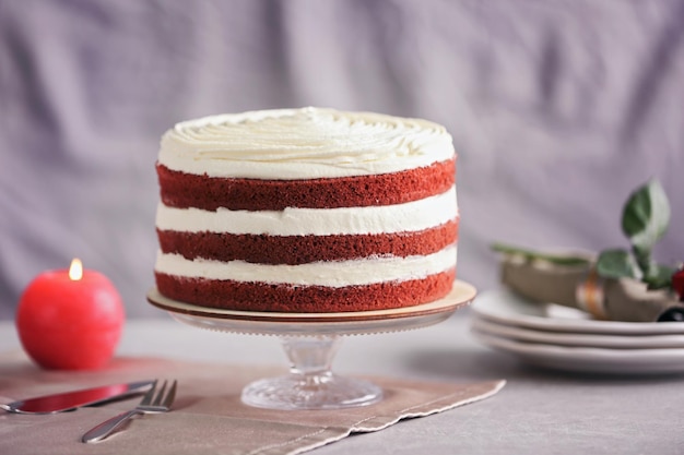 Delicious cake on gray table