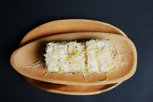 delicious cakes on the wooden plate from the top