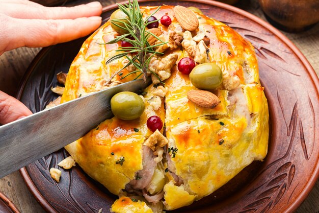 Delicious camembert cheese baked in dough and bacon