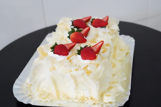 delicious candied strawberry cake on the table