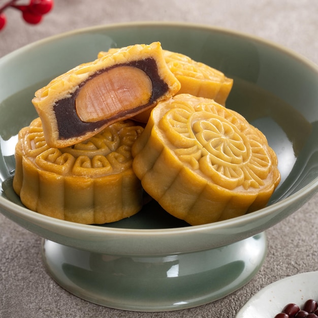 Delicious Cantonese moon cake for MidAutumn Festival food mooncake on gray table background