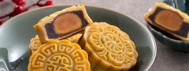 Delicious Cantonese moon cake for MidAutumn Festival food mooncake on gray table background