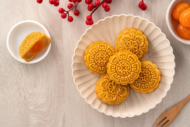 Delicious cantonese moon cake for midautumn festival food mooncake on wooden table background