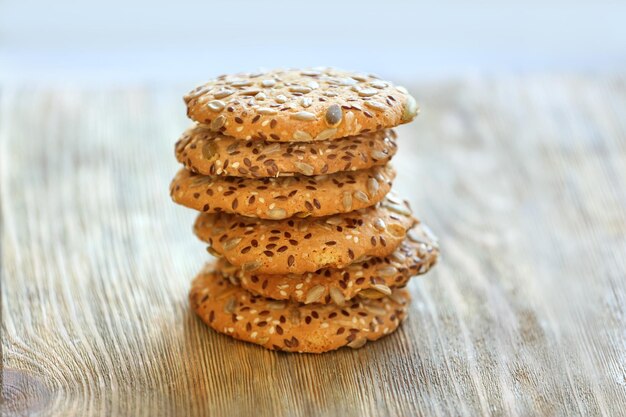 Delicious cereal cookies on wooden table