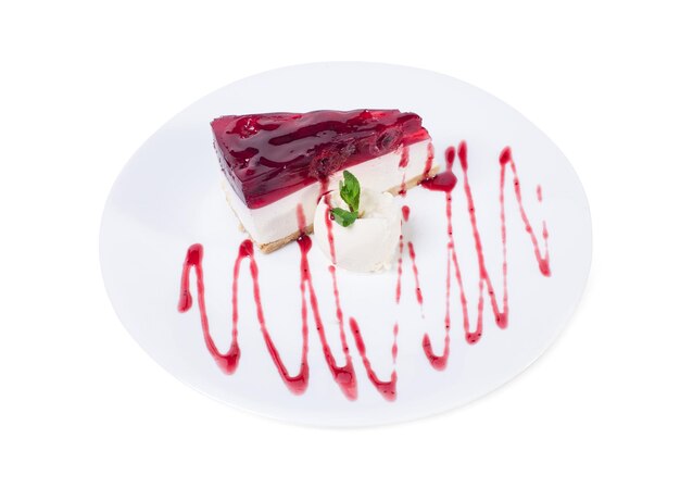 Delicious cherry cheesecake with mint and vanilla ice cream scoop Isolated on a white background