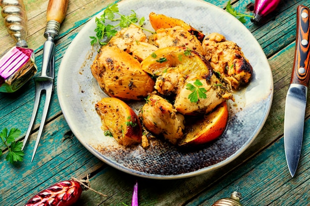 Delicious chicken breast with oranges on the Christmas festive.