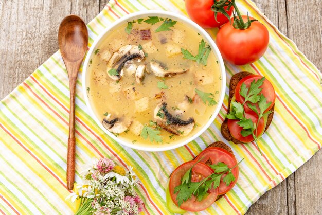 Delicious chicken soup with mushrooms.