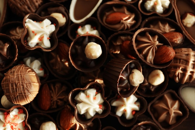 Delicious chocolate candies background, close up