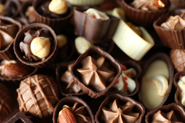 Delicious chocolate candies background, close up