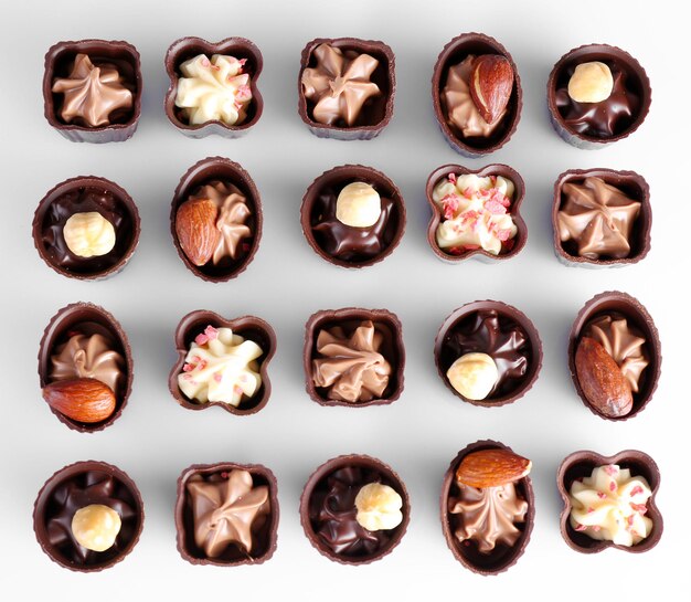 Delicious chocolate candies on white background