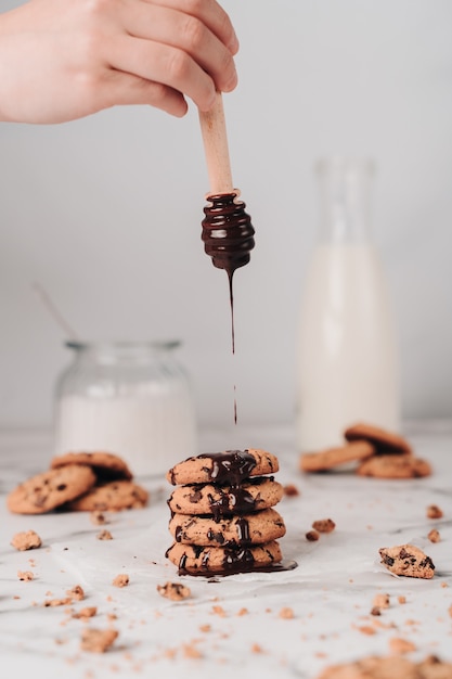 Delicious chocolate chip cookies while being topped