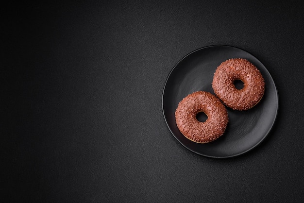 Delicious chocolate glazed donut sprinkled with chocolate chips