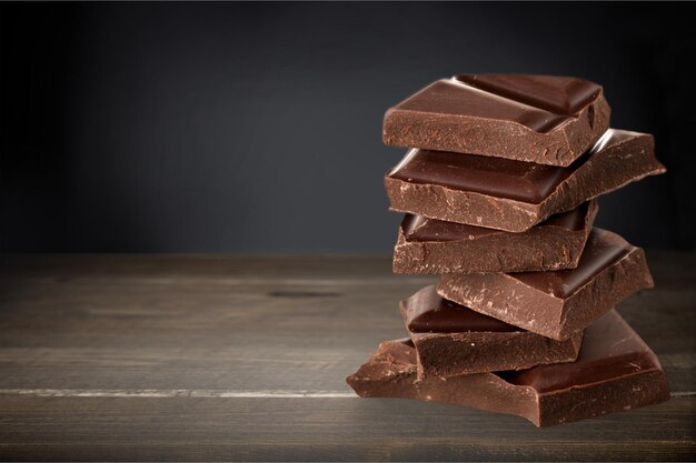 Delicious chocolates isolated on  background