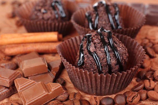 Delicious chocolates on table close-up