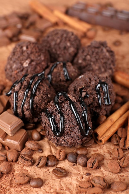 Delicious chocolates on table close-up