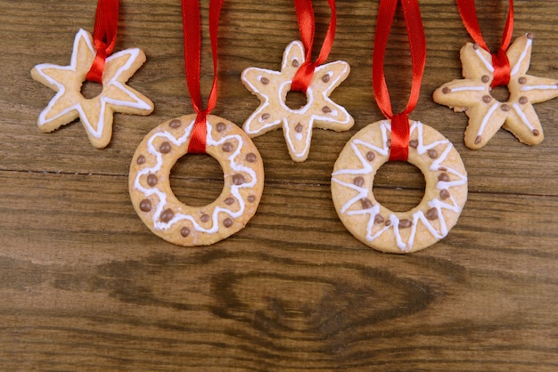 Delicious Christmas cookies on wooden background