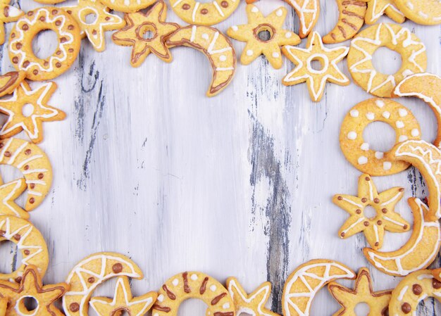 Delicious Christmas cookies on wooden background