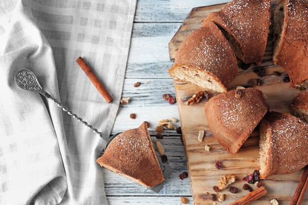 Delicious cinnamon roll cake on table