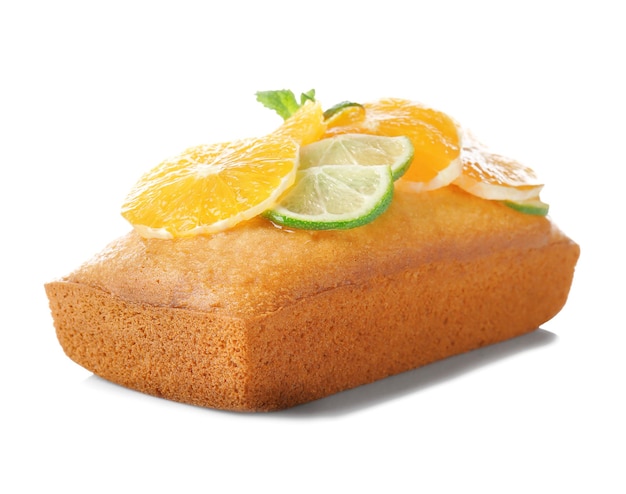 Delicious citrus cake with sliced fruits on white background