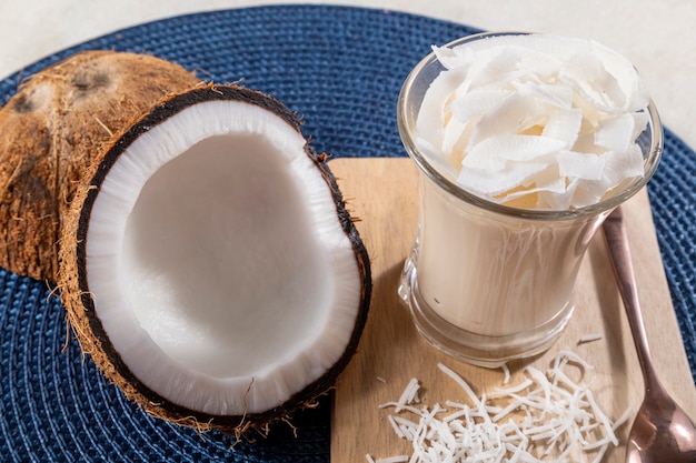 Delicious coconut mousse in glass cup.