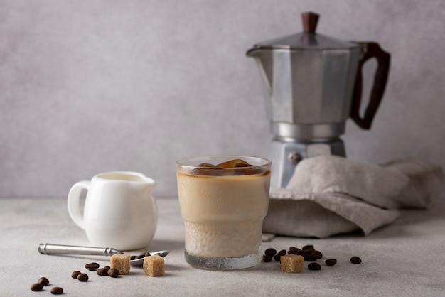 Delicious coffee cup and sugar cubes