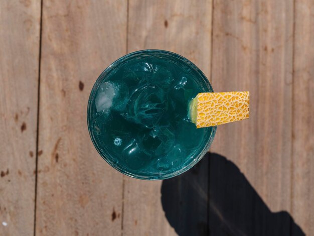 A delicious and cold blue alcoholic cocktail