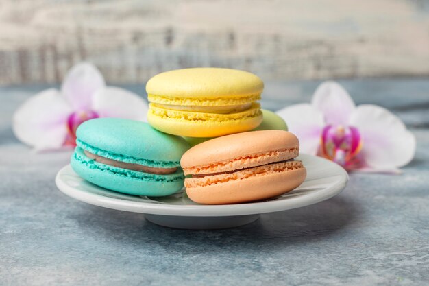 Delicious colorful cookies macarons on the plate