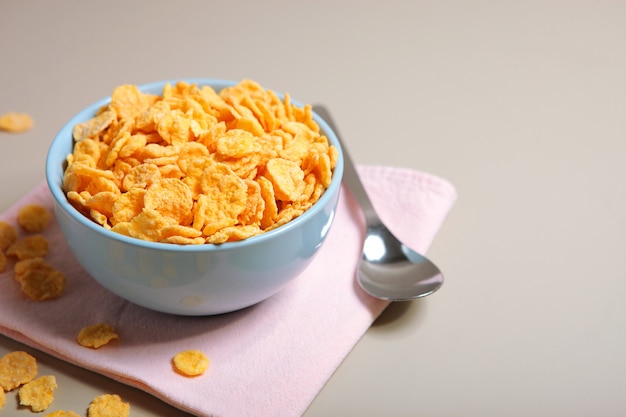 Delicious cornflakes in a plate on the table