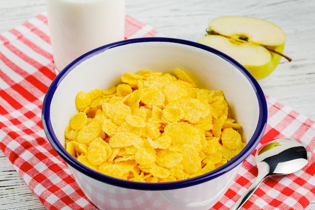 Delicious cornflakes on a red napkin.