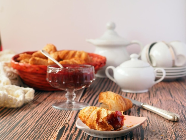 Delicious croissants with jam for breakfast