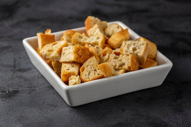 Delicious crunchy croutons on the table