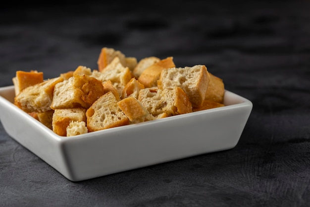 Delicious crunchy croutons on the table